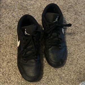 Nike Jordan 1 Low TD Football Cleat in the black and white colorway